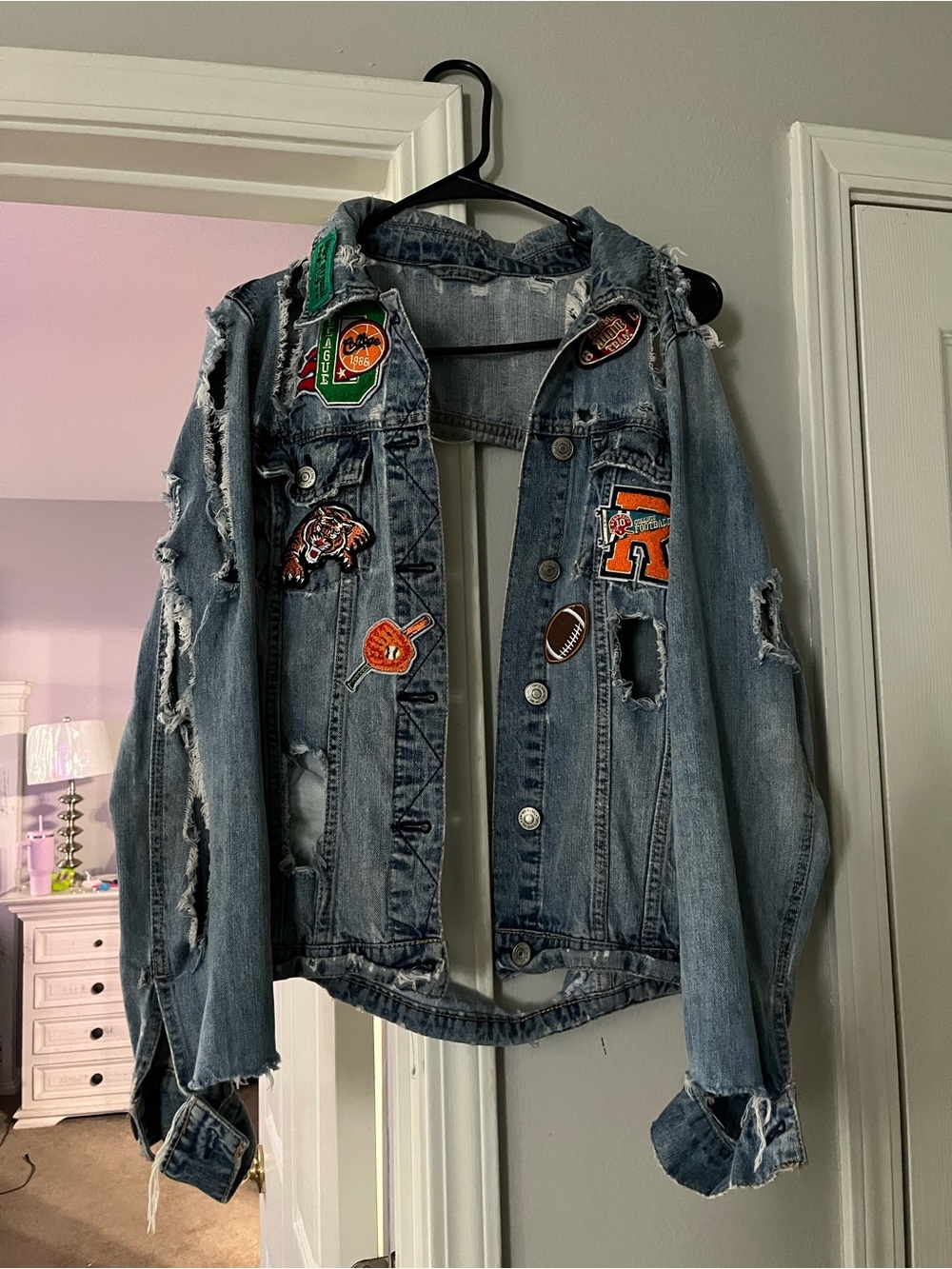 Levi's Distressed Blue Denim Jacket with Colorful Patches